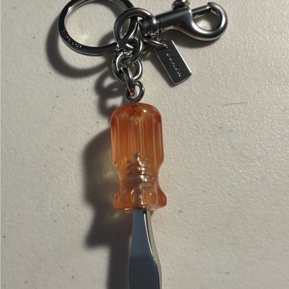 Coach Handbags - Coach Opaque Peach Colored Screwdriver Keychain/Bag Charm